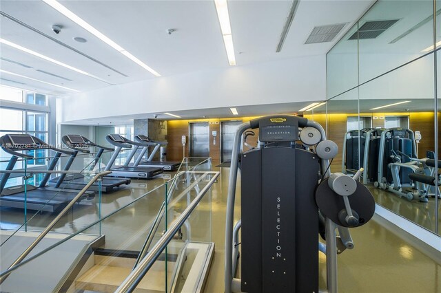 exercise room featuring visible vents