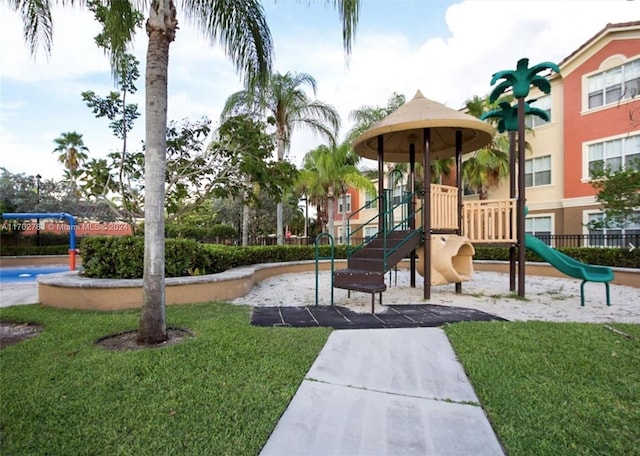 view of playground featuring a yard