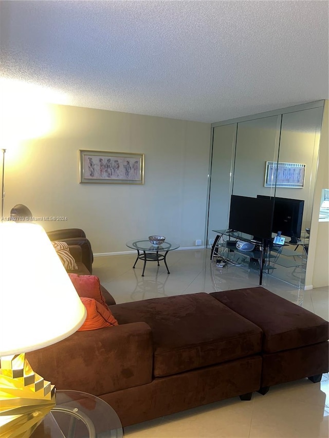 living room with a textured ceiling