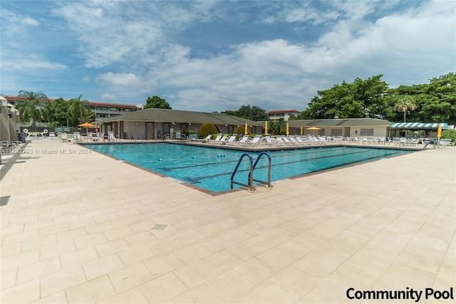 view of pool featuring a patio area