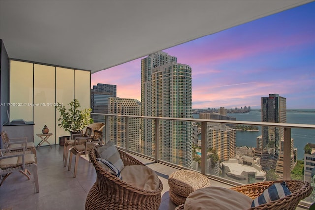 balcony at dusk with a water view