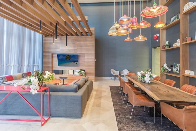 dining room with a high ceiling