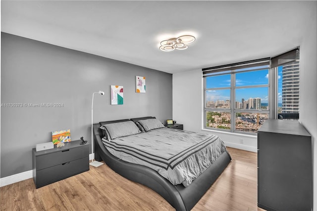 bedroom featuring hardwood / wood-style floors