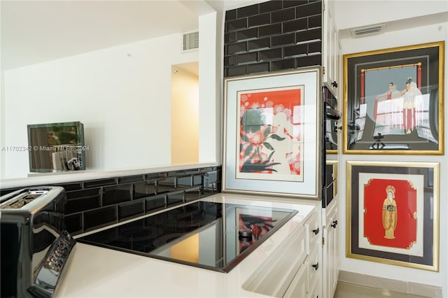 kitchen with white cabinetry