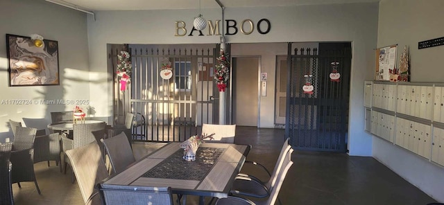 dining area featuring mail boxes and elevator