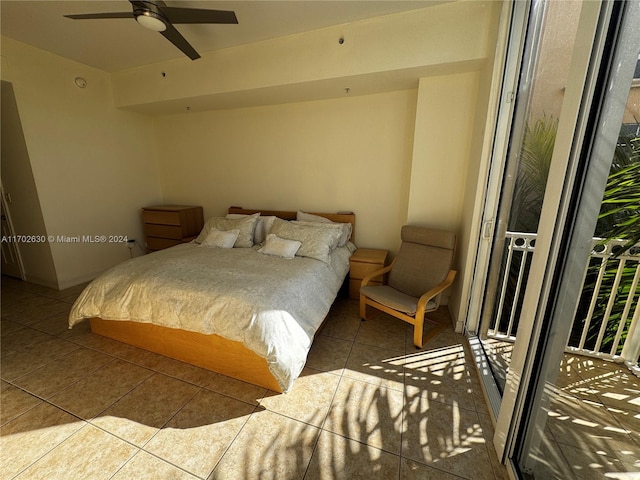 tiled bedroom featuring ceiling fan