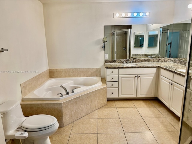 full bathroom featuring tile patterned flooring, vanity, toilet, and plus walk in shower