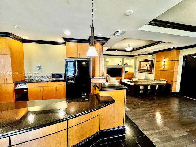 kitchen with sink, a raised ceiling, dark hardwood / wood-style flooring, black appliances, and ornamental molding