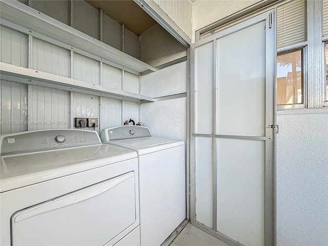 laundry room with washer and clothes dryer