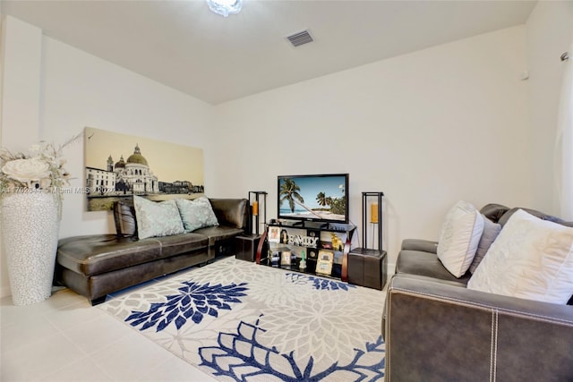 living room featuring lofted ceiling