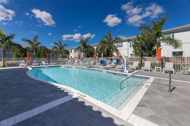 view of swimming pool featuring a patio