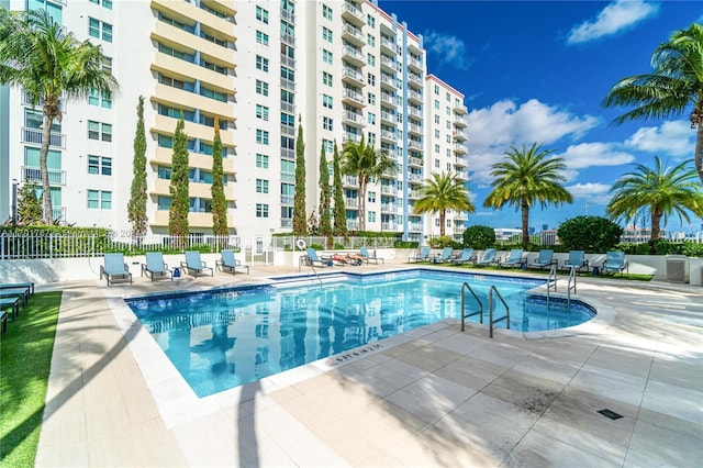 view of swimming pool featuring a patio