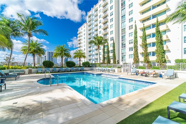 view of swimming pool with a patio area