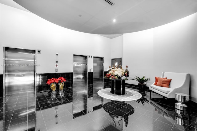 3000 Coral Way Unit 1502, Miami, FL 33145 - building lobby featuring a high ceiling