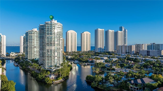 property's view of city with a water view