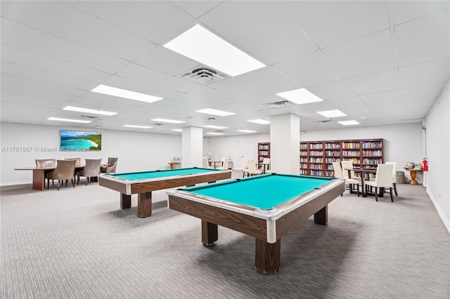 recreation room with carpet, a paneled ceiling, and billiards