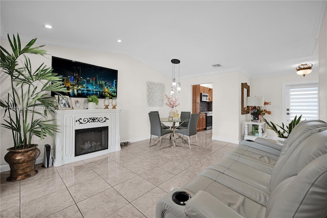 living room with lofted ceiling and crown molding