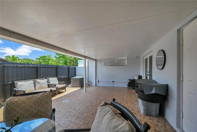 view of patio / terrace featuring central air condition unit and an outdoor living space