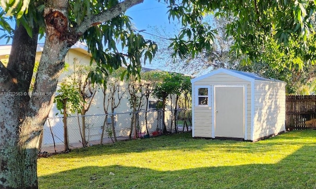 view of outdoor structure with a yard