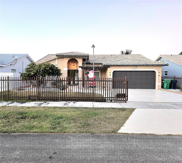 view of front of home featuring a garage