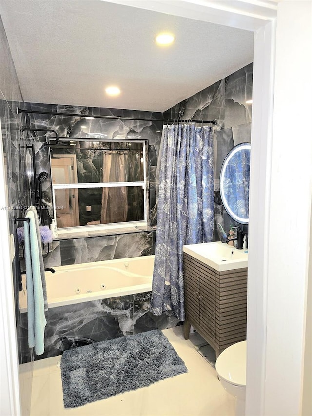 full bathroom featuring vanity, toilet, and shower / tub combo with curtain