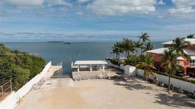 water view featuring a boat dock and a view of the beach