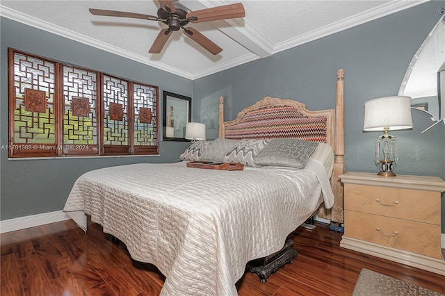 bedroom with a textured ceiling, ceiling fan, crown molding, and dark hardwood / wood-style floors