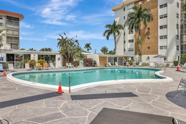 view of pool featuring a patio