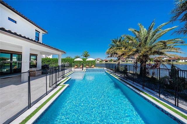 view of swimming pool featuring a patio