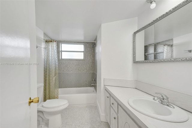 full bathroom featuring tile patterned flooring, vanity, shower / bath combination with curtain, and toilet