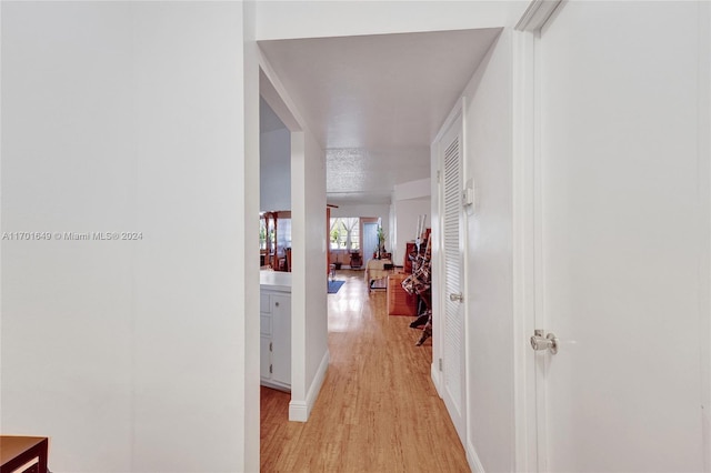 hallway featuring light wood-type flooring