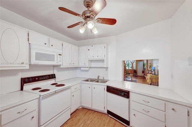 kitchen featuring white appliances, white cabinets, sink, ceiling fan, and light hardwood / wood-style floors