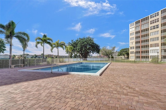 view of pool featuring a patio area