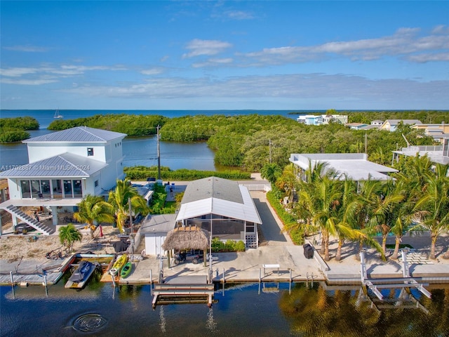 drone / aerial view featuring a water view