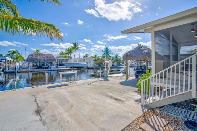 dock area featuring a gazebo and a water view