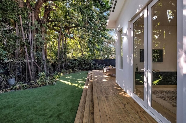 view of yard with french doors