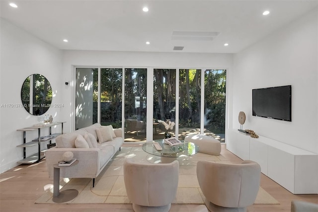 living room with light hardwood / wood-style floors