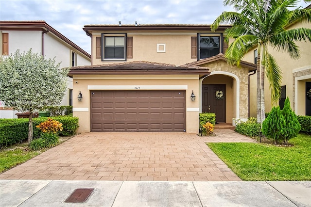 view of front of property featuring a garage