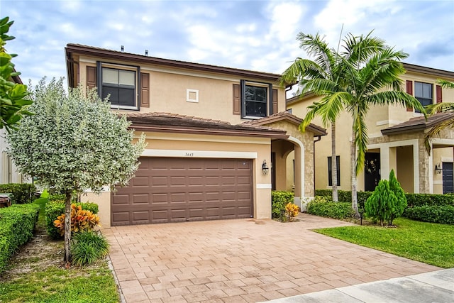 view of front of property with a garage