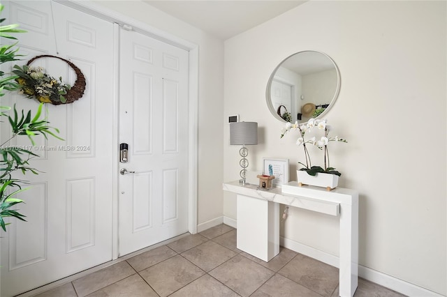 view of tiled foyer