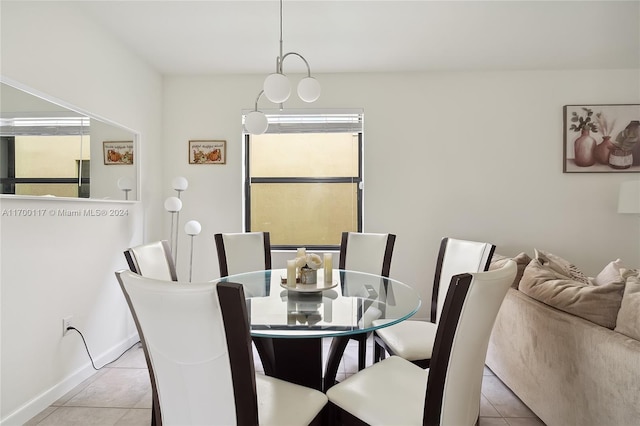 tiled dining space with a wealth of natural light