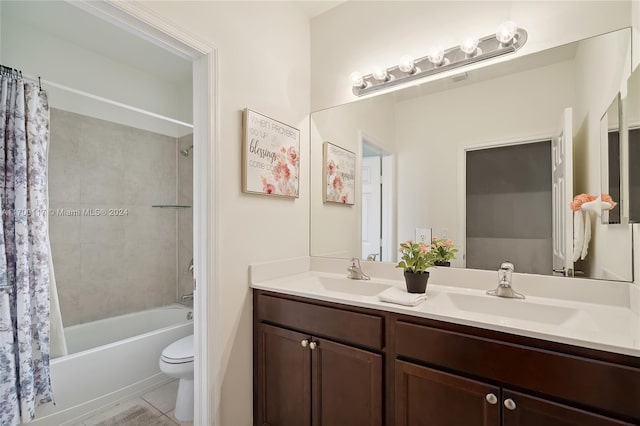 full bathroom with shower / tub combo, vanity, toilet, and tile patterned floors