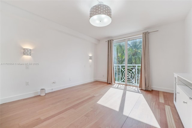 empty room with light wood-type flooring