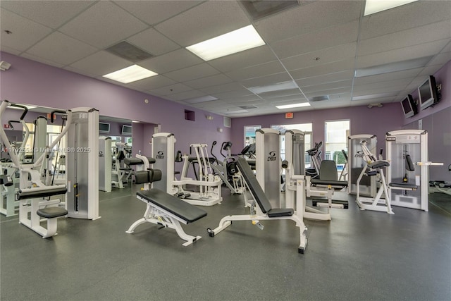 workout area with a drop ceiling