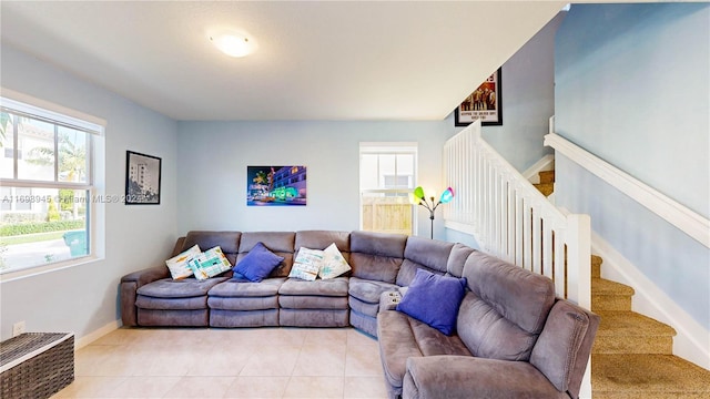 living room with light tile patterned floors