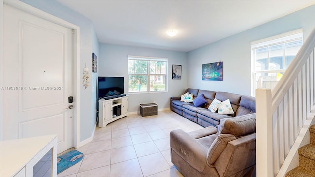 living room featuring light tile patterned floors