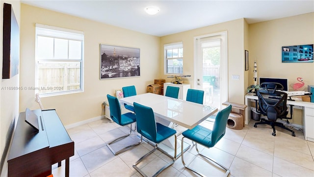 dining room with light tile patterned flooring