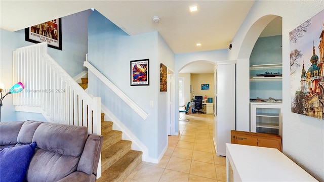 interior space with light tile patterned floors