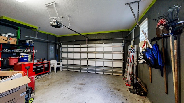 garage featuring a garage door opener