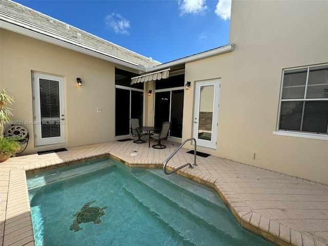 view of pool with a patio